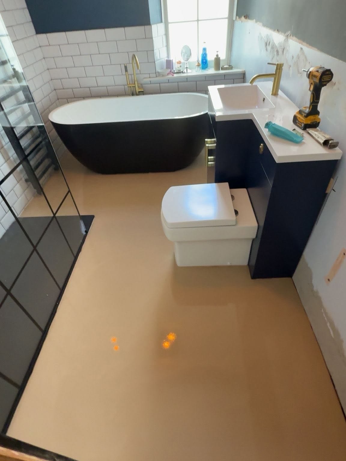 Luxury domestic bathroom with freestanding bath and premium finishes